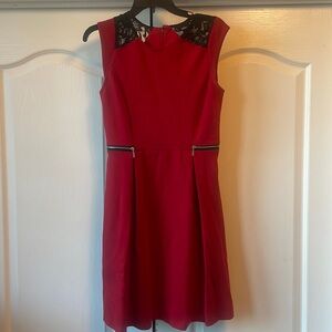 Red and Black dress with lace on the top and zippers on the side